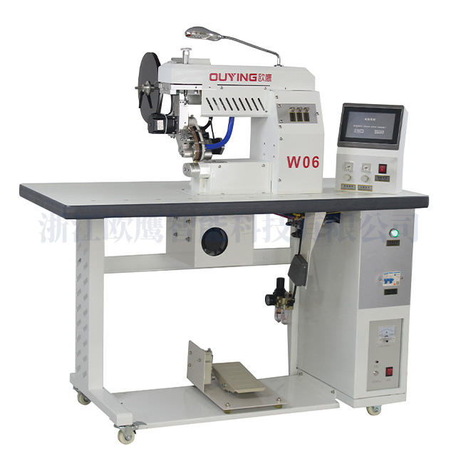 W06 ULTRASONIC TAPING MACHINE 